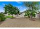 Expansive backyard showcasing lush greenery, mature trees, and a private pool area, perfect for outdoor enjoyment at 4430 Eureka Cir, Las Vegas, NV 89103