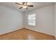 Cozy bedroom featuring hardwood floors, ceiling fan and bright natural light at 4430 Eureka Cir, Las Vegas, NV 89103