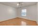 Bright bedroom features wood floors, a modern light fixture and a window for lots of natural light at 4430 Eureka Cir, Las Vegas, NV 89103