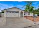 Charming single-story home featuring a two-car garage and low-maintenance desert landscaping at 4430 Eureka Cir, Las Vegas, NV 89103