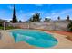 Beautiful backyard pool featuring a spacious deck and privacy fencing, providing a serene outdoor oasis at 4430 Eureka Cir, Las Vegas, NV 89103
