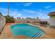 Backyard featuring a swimming pool and hot tub, providing a perfect setting for relaxation and recreation at 4430 Eureka Cir, Las Vegas, NV 89103