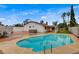 Sparkling pool with a hot tub, surrounded by a well-kept patio and lush landscaping, ideal for relaxation at 4430 Eureka Cir, Las Vegas, NV 89103