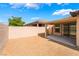 Well-maintained backyard features gravel, concrete, and a covered patio for outdoor activities at 4436 Hatch Bend Ave, North Las Vegas, NV 89031