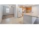 Bright kitchen with stainless steel appliances, granite countertops, and an island breakfast bar at 4436 Hatch Bend Ave, North Las Vegas, NV 89031
