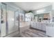A large bathroom with separate tub and shower and dual sinks at 4515 Sandstone Vista Ct, North Las Vegas, NV 89031