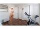 Bright bedroom featuring wood floors and closet at 4515 Sandstone Vista Ct, North Las Vegas, NV 89031