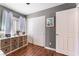 A bedroom featuring wood floors, natural light and closet at 4515 Sandstone Vista Ct, North Las Vegas, NV 89031