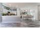 Bright open concept kitchen and dining area with modern stainless steel appliances at 4515 Sandstone Vista Ct, North Las Vegas, NV 89031
