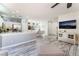 Open-concept living area seamlessly connects the kitchen and dining space at 4515 Sandstone Vista Ct, North Las Vegas, NV 89031