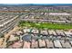 Extensive neighborhood with homes, a golf course and distant mountains at 4980 Pensier St, Las Vegas, NV 89135