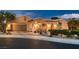 Beautiful single-story home with desert landscaping, well-maintained lawn, and inviting curb appeal at 4980 Pensier St, Las Vegas, NV 89135
