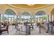 Circular lounge area overlooking peaceful pond with comfortable seating and scenic views at 4980 Pensier St, Las Vegas, NV 89135