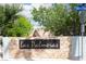 Elegant community signage with stone accents and lush landscaping at 5541 Alvarez St, North Las Vegas, NV 89031
