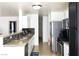 Well-appointed kitchen featuring modern appliances, granite countertops, and ample storage space at 5541 Alvarez St, North Las Vegas, NV 89031