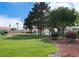 Lush community park with green lawns, mature trees, and walking paths at 5541 Alvarez St, North Las Vegas, NV 89031