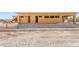 The backyard is being prepped for landscaping, showing exposed framing and space for outdoor activities at 5885 St Ebbes Ct, Las Vegas, NV 89131