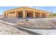 A backyard view shows construction progress with wood framing; a canvas for future outdoor living features at 5885 St Ebbes Ct, Las Vegas, NV 89131