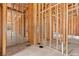 Unfinished bathroom interior features wood framing and in-floor plumbing, offering a blank canvas to customize at 5885 St Ebbes Ct, Las Vegas, NV 89131