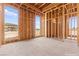 Spacious bedroom 1 with wood framing and ample natural light at 5885 St Ebbes Ct, Las Vegas, NV 89131