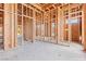 Spacious bedroom 2 with wood framing and ample natural light at 5885 St Ebbes Ct, Las Vegas, NV 89131