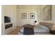 Inviting bedroom with king bed, fireplace, and minimalist decor at 5885 St Ebbes Ct, Las Vegas, NV 89131