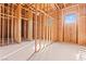 Spacious unfinished closet interior features wood framing, offering a blank canvas for custom storage solutions at 5885 St Ebbes Ct, Las Vegas, NV 89131