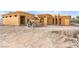 New construction of the house, showing skeleton of home with construction equipment present at 5885 St Ebbes Ct, Las Vegas, NV 89131