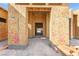 Framed view of entrance of house under construction, showing view of yard through building at 5885 St Ebbes Ct, Las Vegas, NV 89131