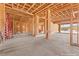 During construction, the dining room displays wooden beam framing, giving buyers freedom to customize to their tastes at 5885 St Ebbes Ct, Las Vegas, NV 89131