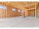 The garage space displays exposed framing and a concrete floor, offering potential for customization and vehicle storage at 5885 St Ebbes Ct, Las Vegas, NV 89131