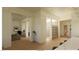 Spacious living area showcasing an open floor plan, modern shelving, and neutral tones that create an airy atmosphere at 5885 St Ebbes Ct, Las Vegas, NV 89131