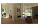 This open concept living space has a fireplace, seating area and view of the bedroom at 5885 St Ebbes Ct, Las Vegas, NV 89131