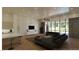 Bright living room with marble accent wall, recessed lights, and modern furnishings at 5885 St Ebbes Ct, Las Vegas, NV 89131