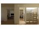Open-concept living space with a view of the dining area, living room with TV, and temperature controlled wine storage at 5885 St Ebbes Ct, Las Vegas, NV 89131