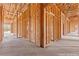 Unfinished primary bedroom featuring wooden beam framing with an open space to customize to your liking during construction at 5885 St Ebbes Ct, Las Vegas, NV 89131