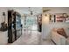 Bright dining room with tile floors, stylish decor, and backyard access at 604 I, Boulder City, NV 89005