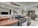 Modern kitchen with black appliances, unique countertops, and a decorative backsplash at 604 I, Boulder City, NV 89005