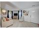 Inviting living room featuring tile floors and a comfortable seating area at 604 I, Boulder City, NV 89005