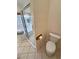 Bathroom showcases a glass-enclosed shower and a white toilet with tile flooring at 6460 Wagon Wheel Ct, Pahrump, NV 89061
