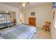 Comfortable bedroom featuring a ceiling fan and a view of the closet at 6460 Wagon Wheel Ct, Pahrump, NV 89061