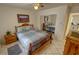 Comfortable bedroom featuring a ceiling fan and built-in storage shelves at 6460 Wagon Wheel Ct, Pahrump, NV 89061