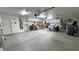 Spacious garage features ample storage with overhead cabinets and plenty of room for parking and projects at 6460 Wagon Wheel Ct, Pahrump, NV 89061