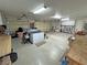Oversized garage offers generous storage, workspace, and parking with overhead lighting at 6460 Wagon Wheel Ct, Pahrump, NV 89061