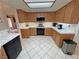 Updated kitchen with modern appliances and sleek countertops for cooking at 6460 Wagon Wheel Ct, Pahrump, NV 89061