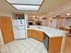 Bright kitchen with ample counter space and seamless transition to living areas at 6460 Wagon Wheel Ct, Pahrump, NV 89061