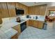 Functional kitchen with integrated appliances and convenient layout at 6460 Wagon Wheel Ct, Pahrump, NV 89061