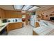 Open-concept kitchen featuring great counter space and cabinet storage at 6460 Wagon Wheel Ct, Pahrump, NV 89061
