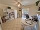 Bright office space with built-in bookshelves and a sliding glass door for natural light at 6460 Wagon Wheel Ct, Pahrump, NV 89061