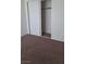 Bedroom closet featuring neutral carpeting and a sliding door at 6512 Sterling Springs Pkwy, Las Vegas, NV 89108